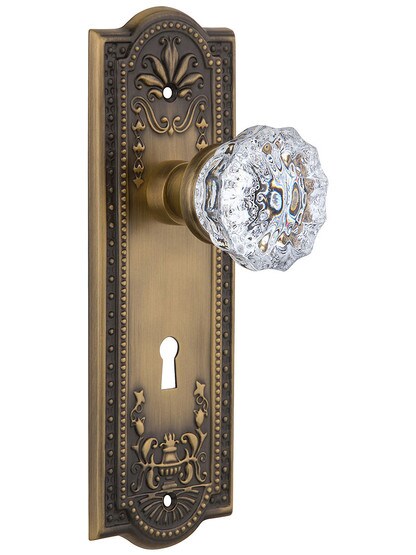 Meadows Style Mortise Lock Set in Antique Brass with Fluted Crystal Glass Door Knobs.